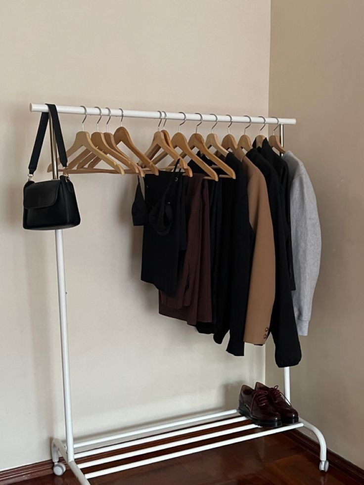 Clothes Hanger Stand With Side Hooks And Bottom Shelves
